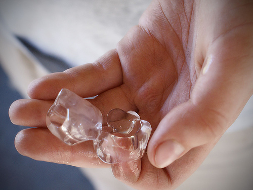 ice cube melting in hand